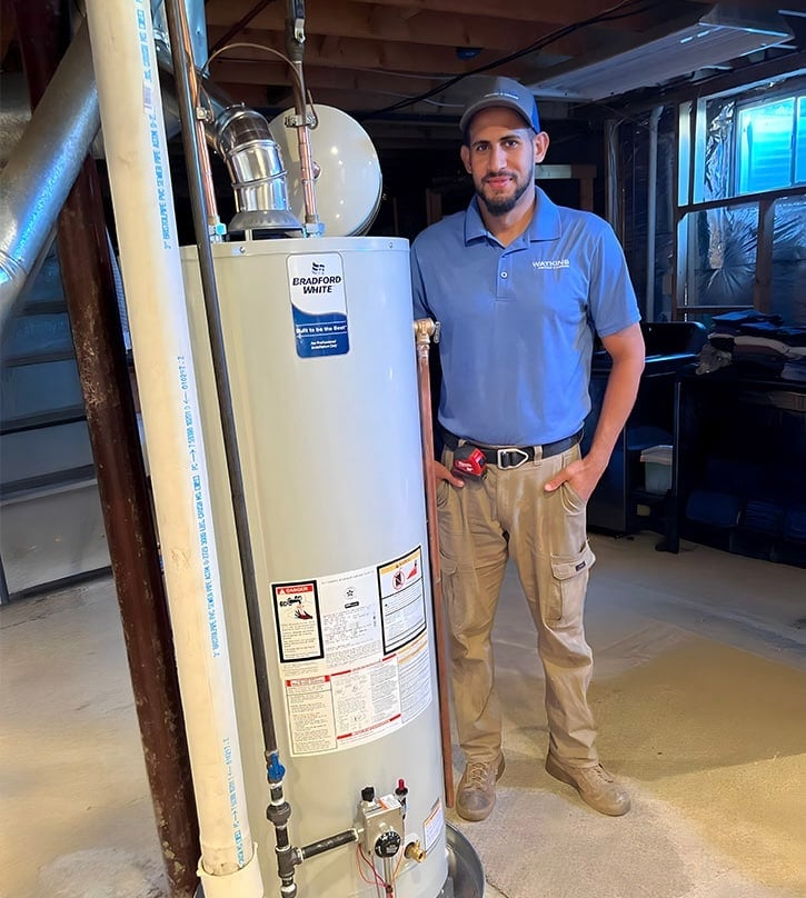 Watkins HVAC Tech with New Water Heater Installation